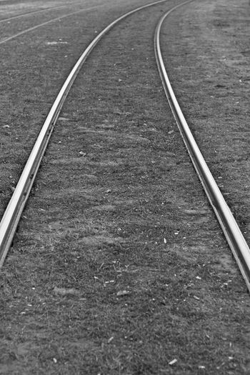 High angle view of railroad tracks black and white 