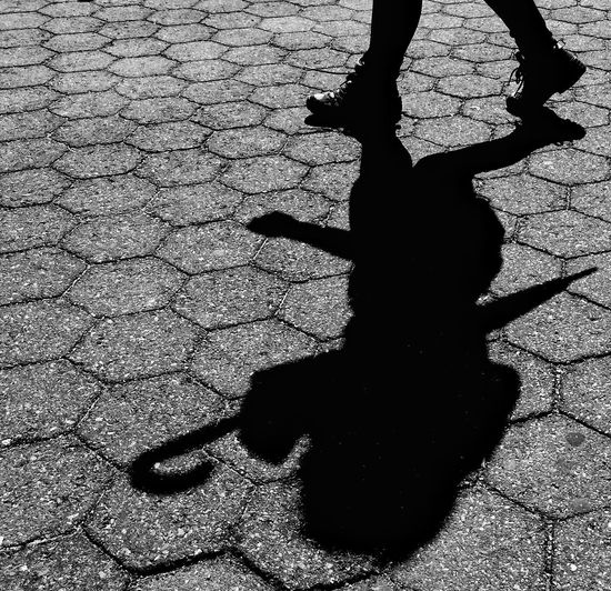 Shadow of people on wall