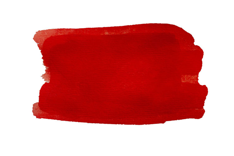 Close-up of red flag against white background