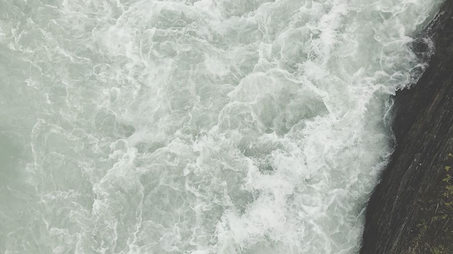 Close-up of waves splashing in sea