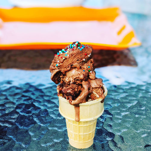 Chocolate ice cream cone on a summer day