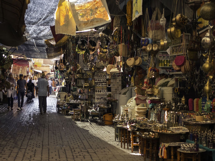 People at market stall at night