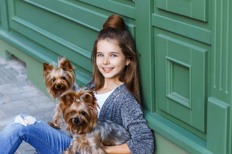 Portrait of girl with dog