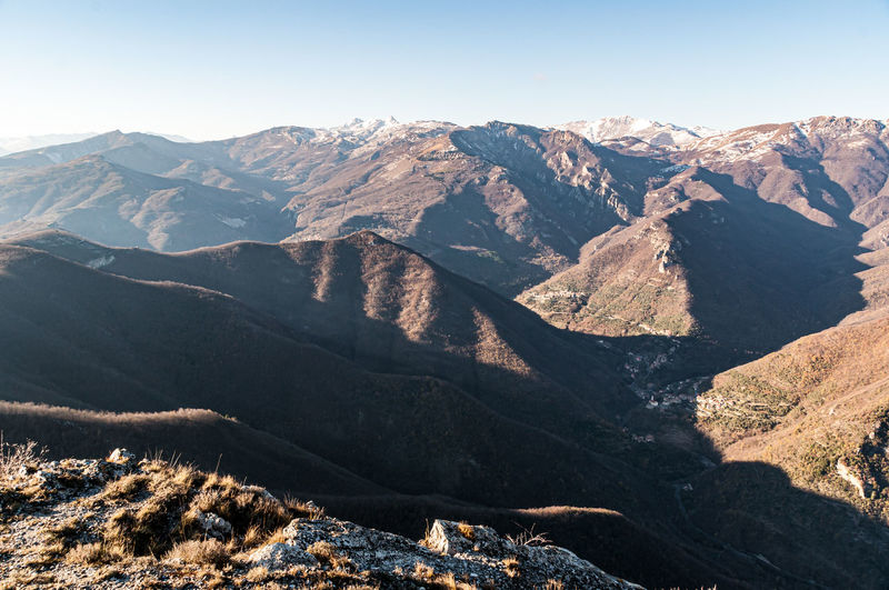 Scenic view of mountains against clear sky