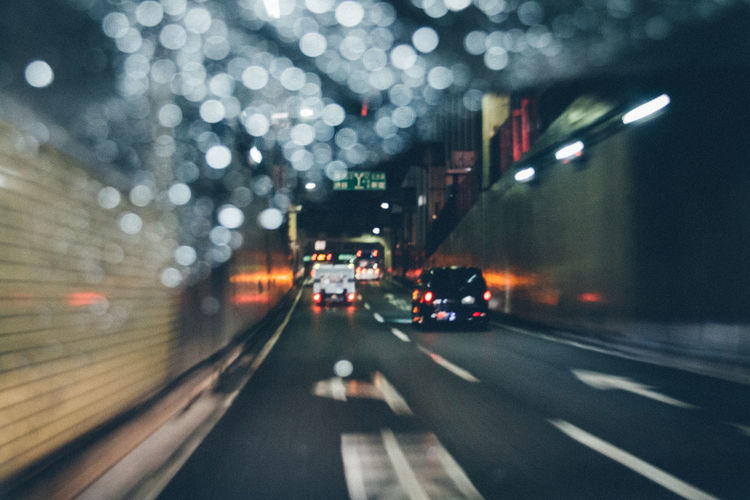 Cars on street at night