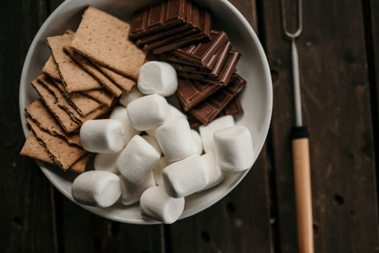 Marshmallow, graham crackers and chocolate s'mores fixings