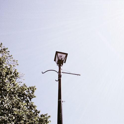 Low angle view of street light against clear sky