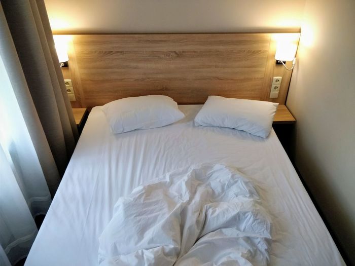 White bed in bedroom