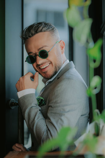 Portrait of young man wearing sunglasses