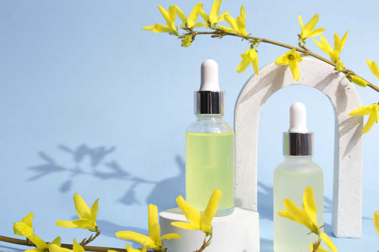 Close-up of bottles against white background