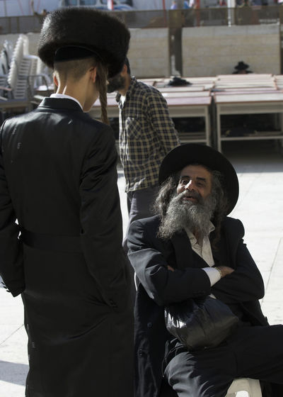 Rabbi talking on street