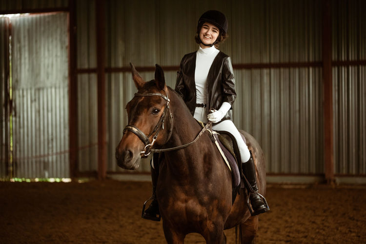 Girl riding a horse. rider on a horse gallop. equestrian sport concept.
