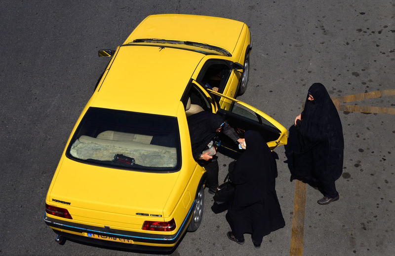 High angle view of yellow car on street