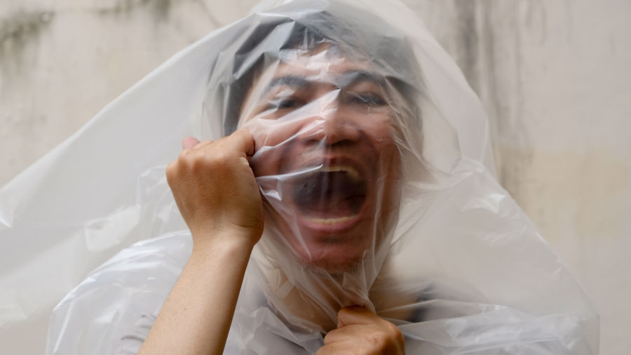 Low section of woman drinking water