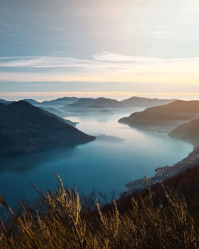 Beautiful view over lago maggiore from corona dei pinci at golden hour lake view from the mountains.