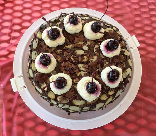 High angle view of homemade black forest cake on table