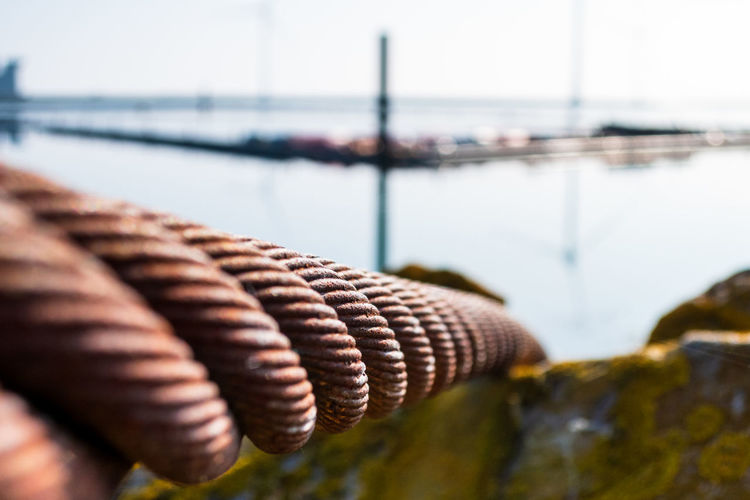 Close-up of rope on pier