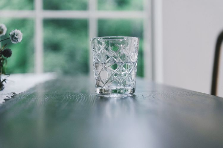 Close-up of glass on table