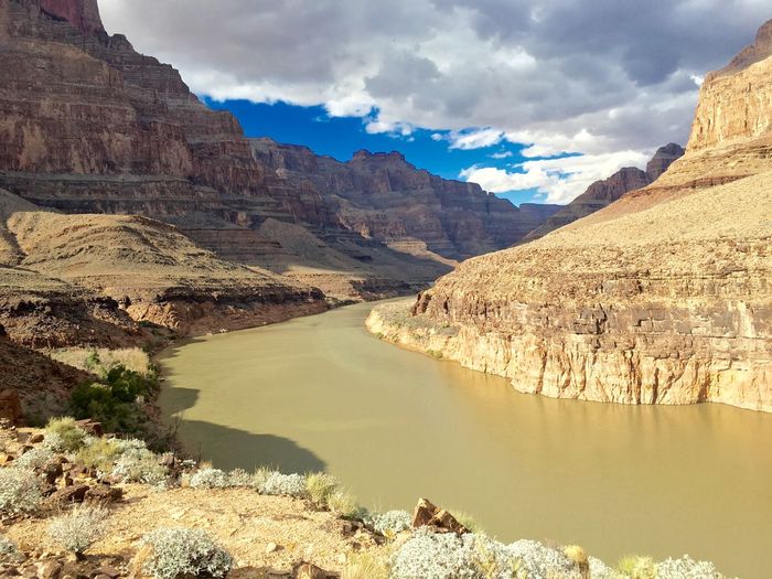 Scenic view of grand canyon against cloudy sky