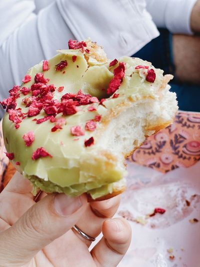Close-up of hand holding ice cream