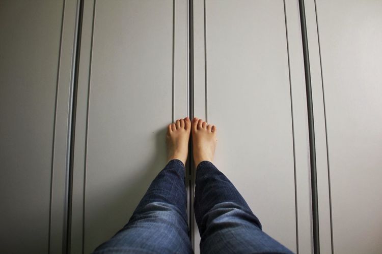 Low section of woman standing on floor
