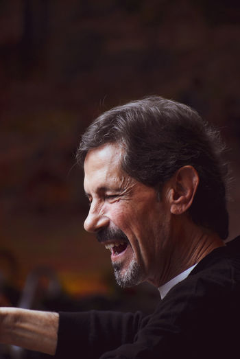 Close-up of smiling mature man
