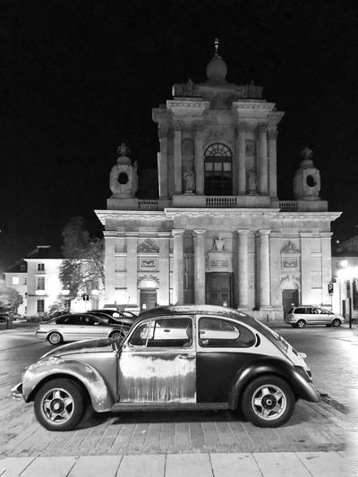 Vintage car on street at night