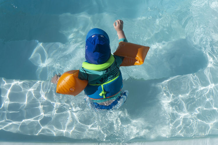 High angle view of toys in swimming pool