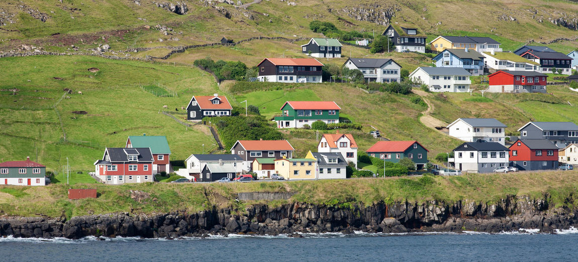 Houses by sea in town