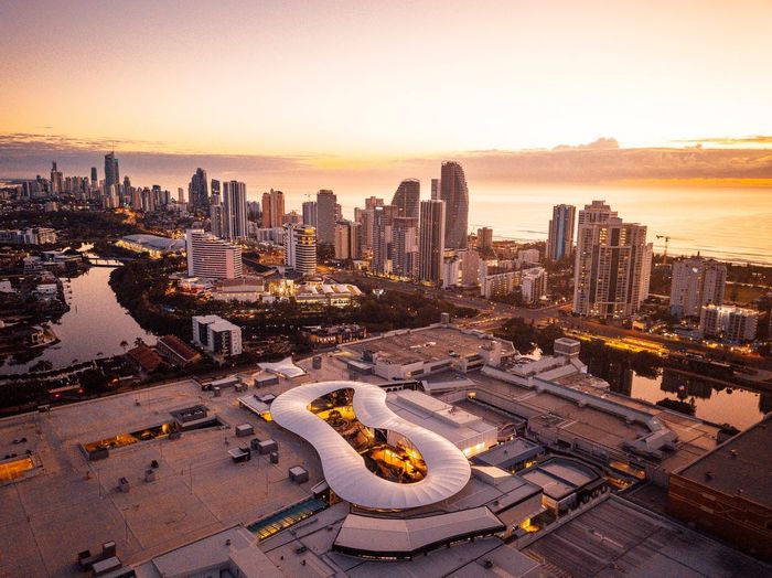 High angle view of city buildings during sunset