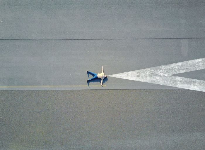 Berlin Dji Droneshot Mavic Pro City Life Airport Airport Runway Solitude One Person People Aerial View High Angle View Concrete Elevated View Modern Architecture Rewilding Breathing Space Man Lying On Back Lying On The Floor Man Lying On The Ground Lying Down Loneliness Eames The Week On EyeEm Lost In The Landscape