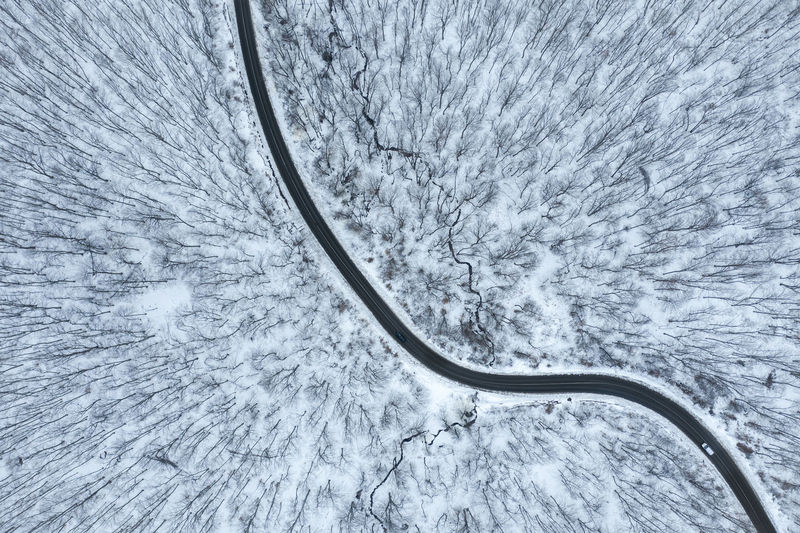 High angle view of snow covered car