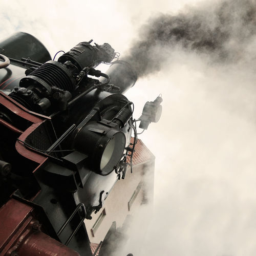 Low angle view of steam train