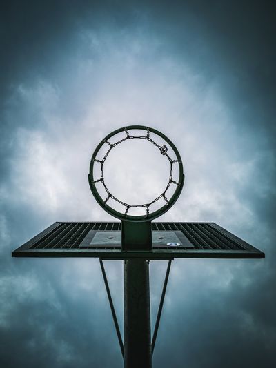 Low angle view of basketball hoop against sky