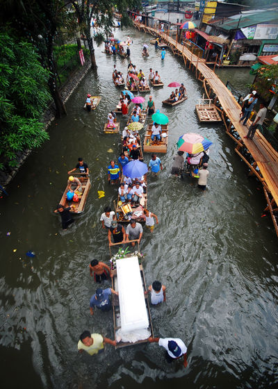 High angle view of people on boats in water