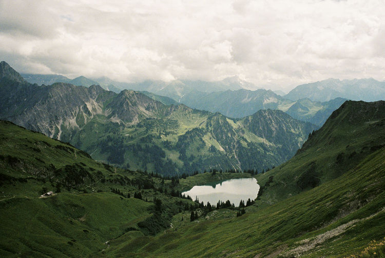 Scenic view of mountain lake near oberstdorf, germany. shot on 35mm kodak portra 800 film.