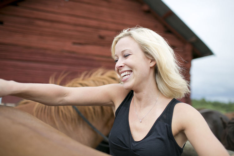 Young woman with horse