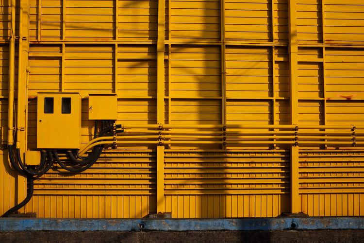 Fuse box yellow wall
