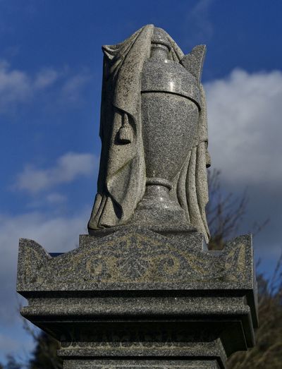 Low angle view of statue against sky