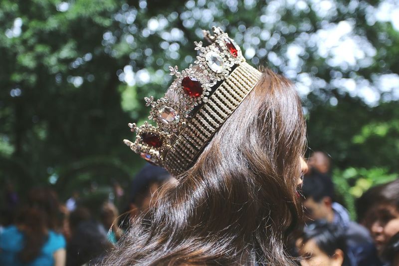 Close-up of woman with crown