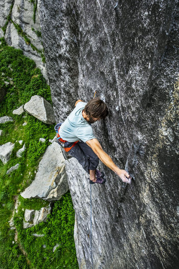 High angle view of man climbing on mountain