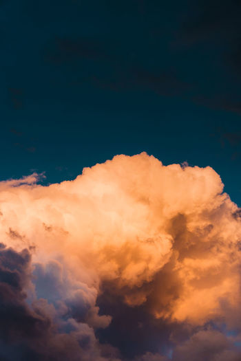 Low angle view of cloudscape against sky during sunset