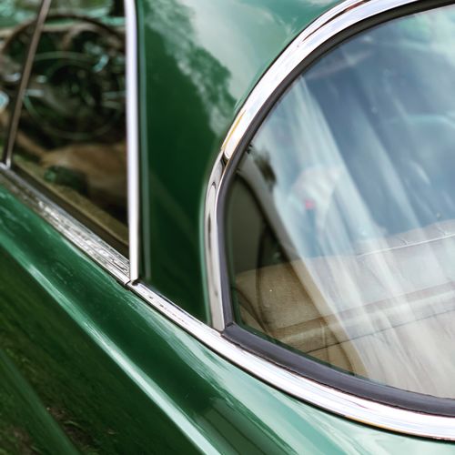 Close-up of green car