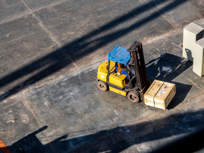 High angle view of man using forklift