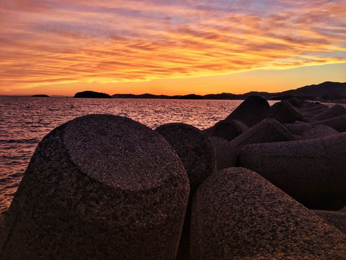 Scenic view of sea against sky during sunset