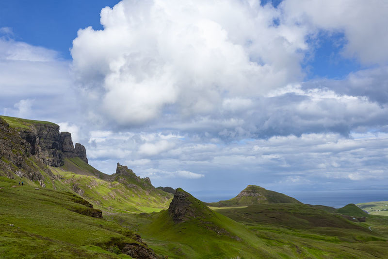 Green fields and blue sky with clouds in quiraing isle of skye scotlan