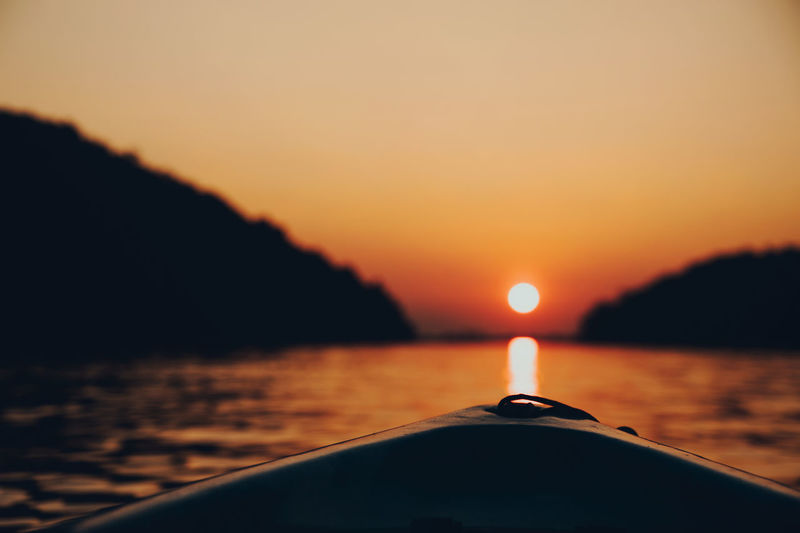 Scenic view of sea against clear sky during sunset
