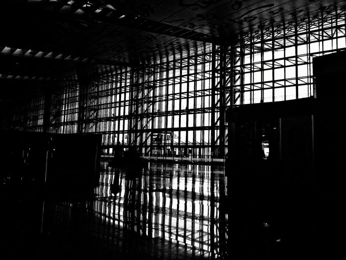 Reflection of metallic window on floor at netaji subhas chandra bose international airport