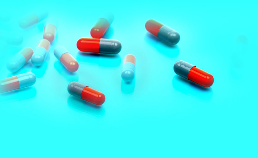 Close-up of pills against blue background