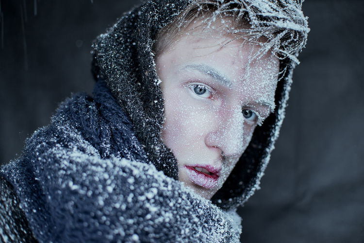 Portrait of man in snow